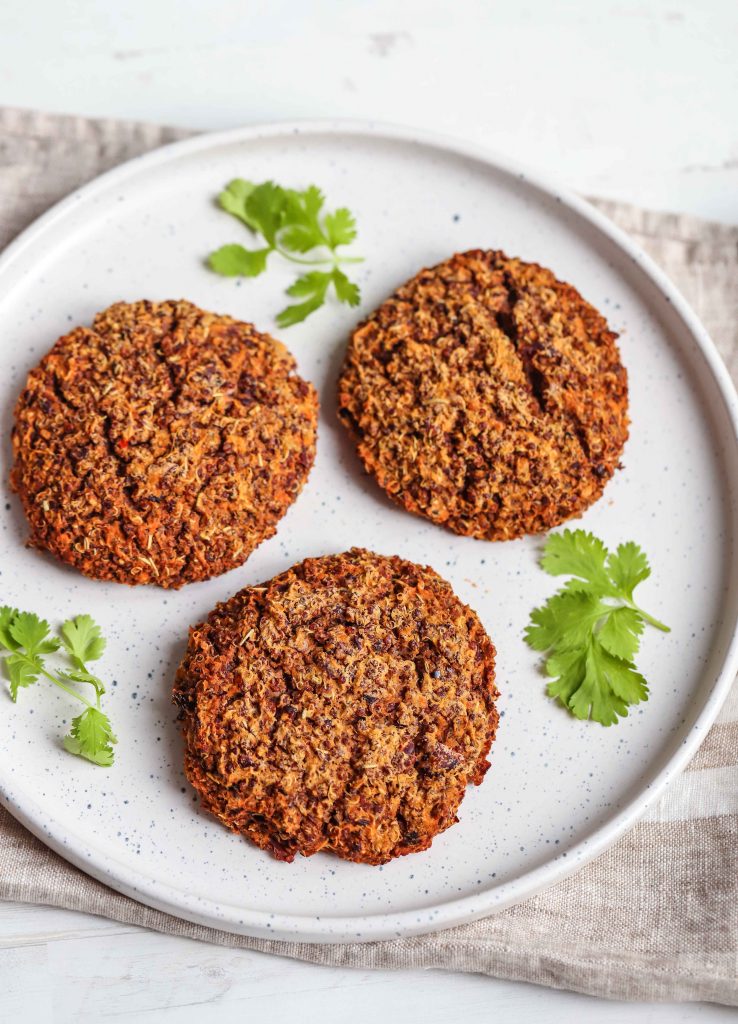 3 Veggie Burgers on a white plate