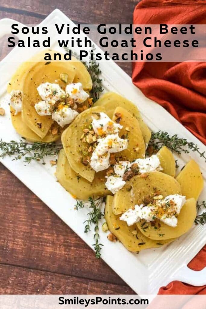 golden beets arranged on a white platter sitting on a wooden table