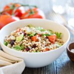 Quinoa,Salad,With,Fresh,Tomatoes,,Cucumbers,And,Salad,Leaves